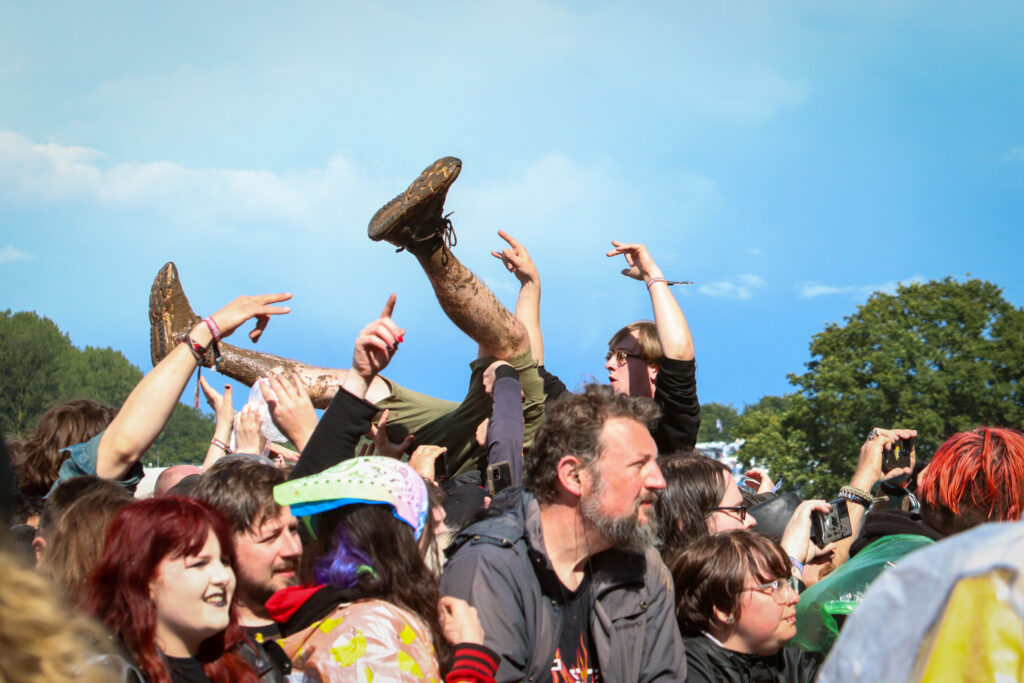 Festival fans crowd surfing